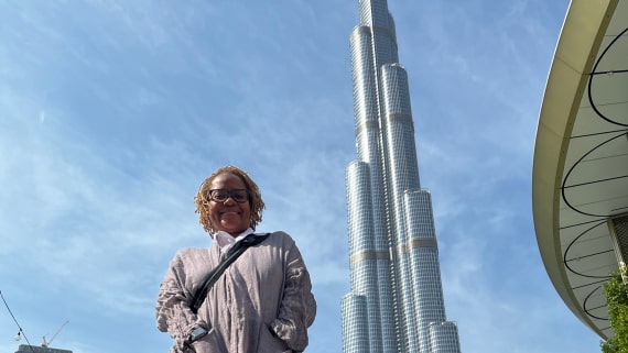 Woman standing in front of Burj Khalifa