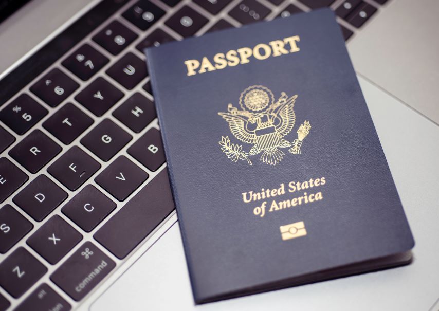 Passport on top of a keyboard