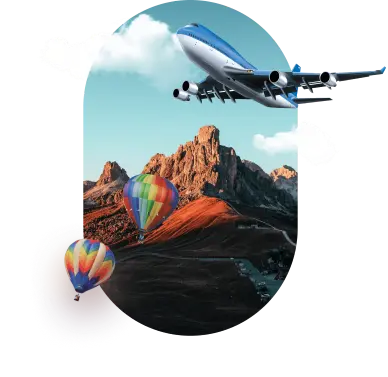 Mountainous landscape with two colorful hot air balloons floating below and airplane