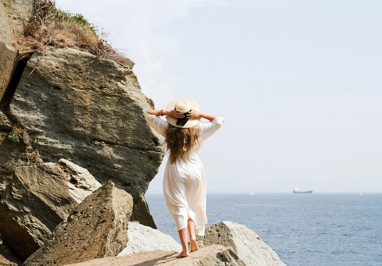 Woman at the Beach for a destination guide