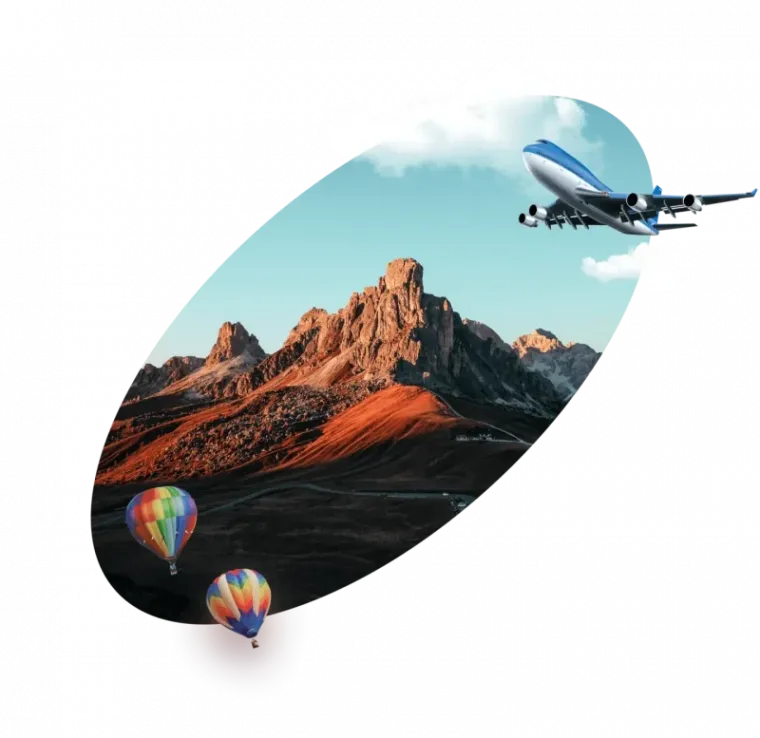 Mountainous landscape with two colorful hot air balloons floating below and airplane