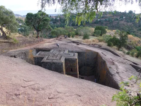 The cross-shaped roof of Bete Giyorgis at Lalibela, cut into the rock so the church sits below ground level in a trench.