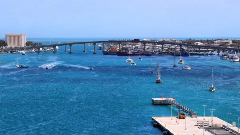 Yachts and cruise berths in Nassau Harbour beneath the Paradise Island bridges.