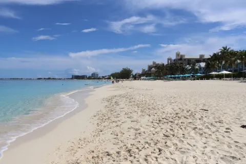 Turquoise shallows and white sand along Seven Mile Beach on Grand Cayman.