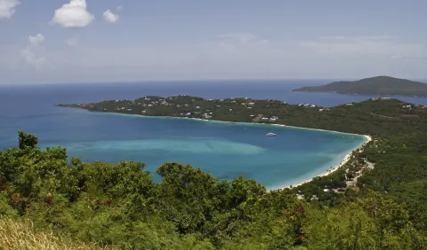 The horseshoe arc of Magens Bay and its white sand beach on St Thomas.