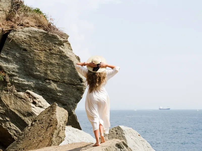 Woman at the Beach for a destination guide