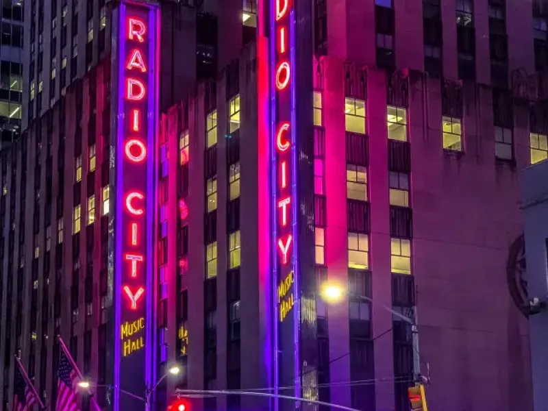 Radio City Music Hall glowing neon marquee at night in New York New York advertising Easy Rider Live Tonight