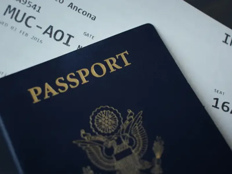 US passport and international boarding pass for flight MUC-AOI; seat 16A; supporting government travel-support document ma