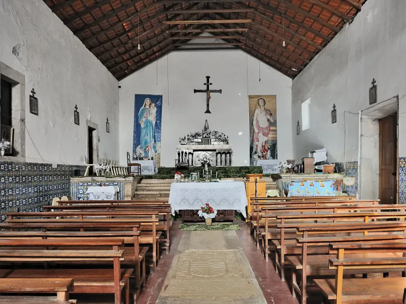 Tiled interior and floor tombs of Nossa Senhora do Rosário, Cidade Velha, among the oldest colonial churches in the tropics.
