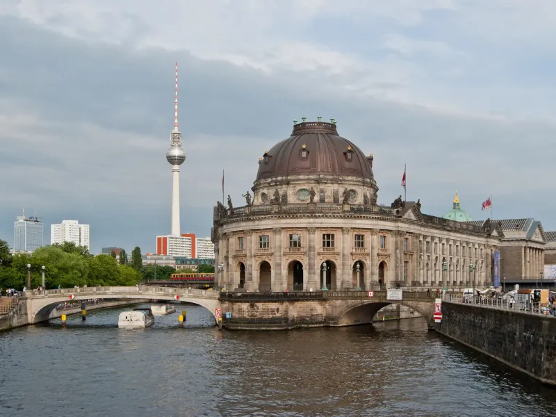 The domed prow of the Bode-Museum at the northern tip of Berlin's Museum Island, the Spree in front, the tower behind.