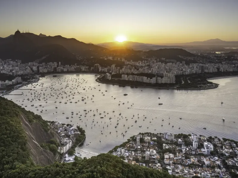 Botafogo Bay in Rio de Janeiro at sunset from Sugarloaf Mountain, its marina full of moored yachts below the city ridges