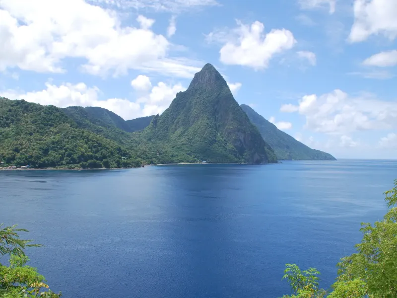Petit Piton rising from the forested shore of Soufriere Bay in Saint Lucia.