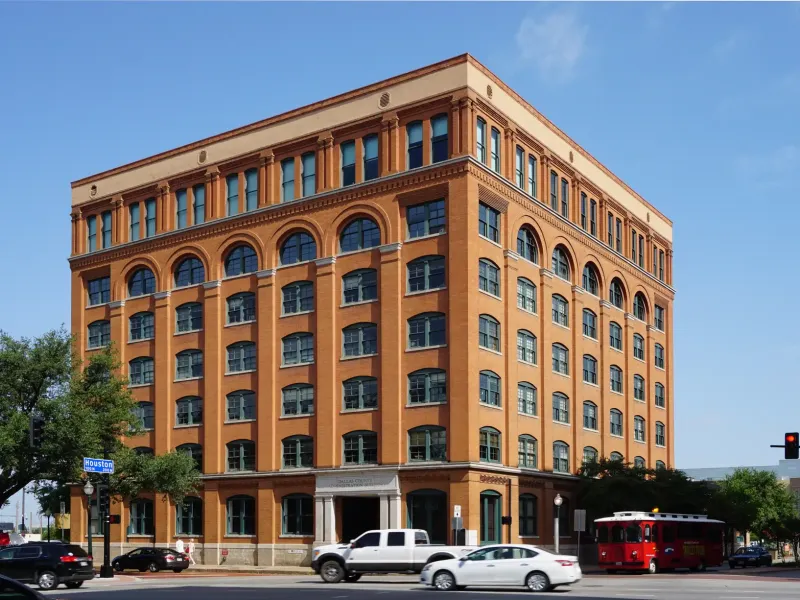 The seven story red brick building at Dealey Plaza in Dallas that houses The Sixth Floor Museum.