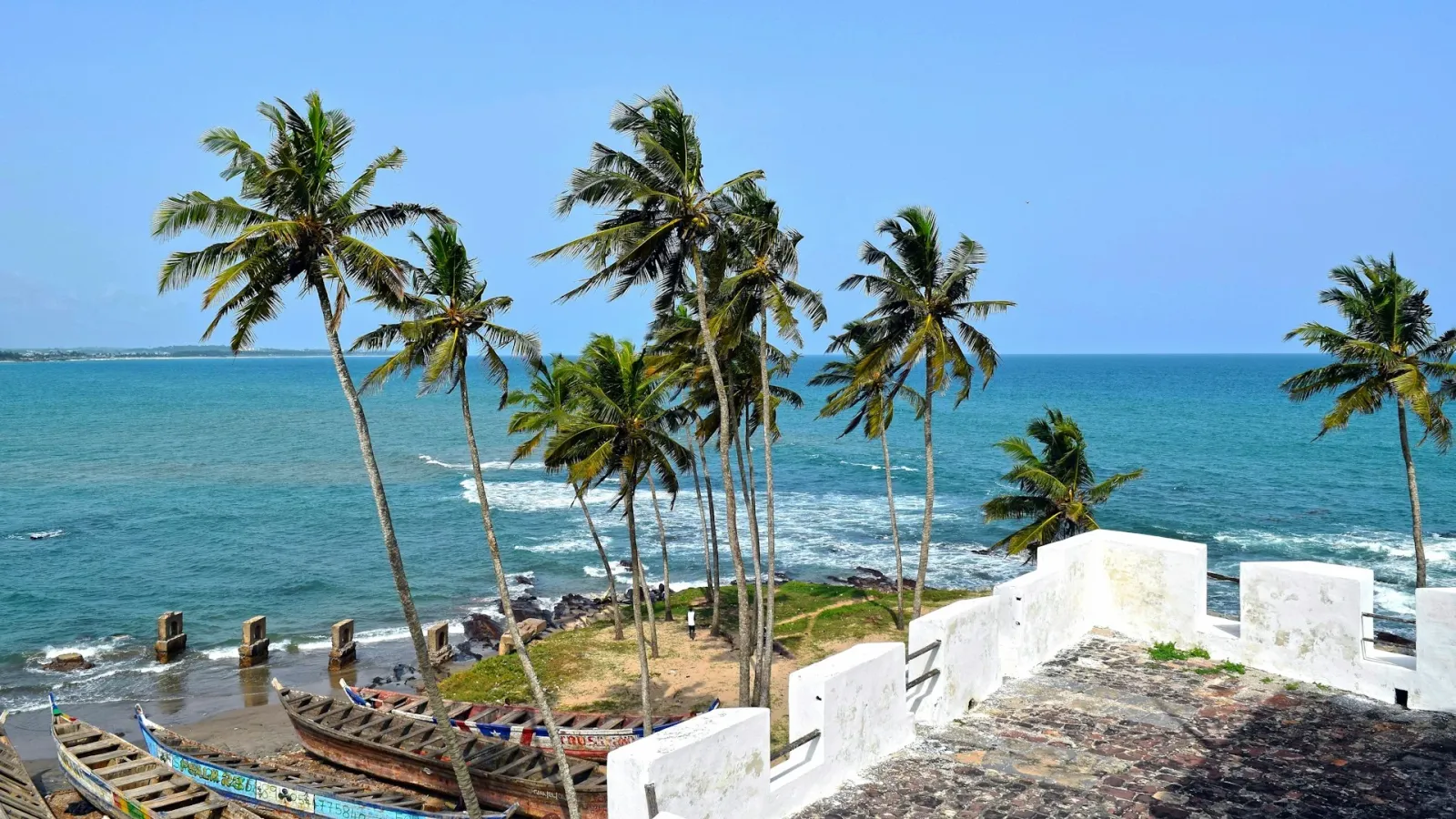 Elmina Castle in Ghana overlooking the Atlantic Ocean, a historic site on Ghana heritage tours and African diaspora travel jo