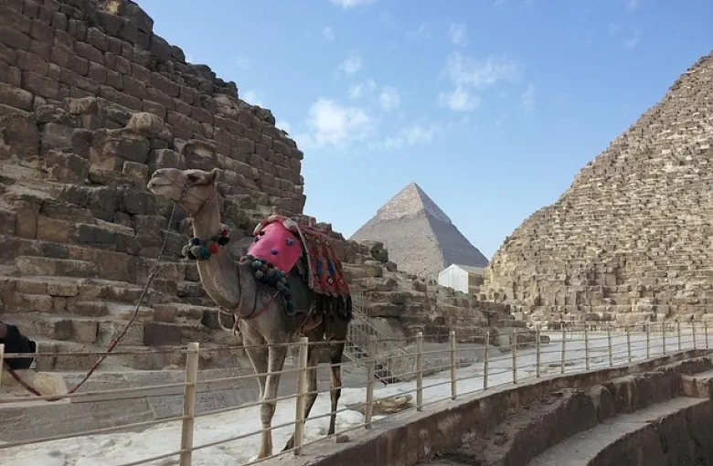 The historic skyline of Cairo, Egypt's capital city, blending ancient Islamic architecture with modern urban landmarks
