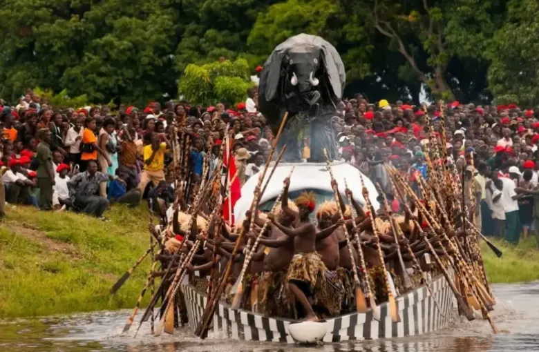 The Nalikwanda royal barge with its elephant effigy moves across floodwater during Kuomboka.