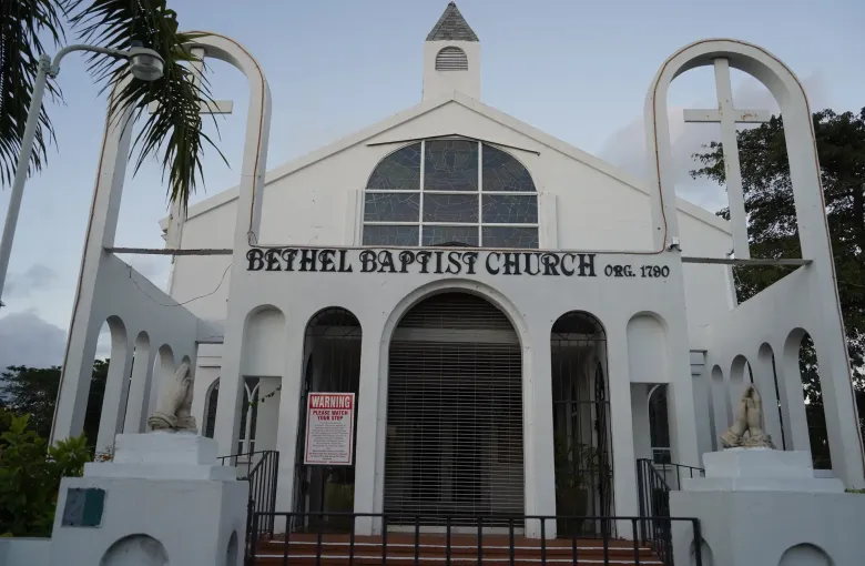 The white facade of Bethel Baptist Church in Nassau, its lettering carrying the date 1790.