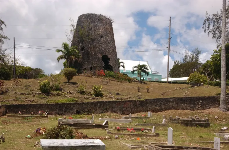 The stone tower of a ruined sugar mill standing on a rise in Saint Philip, Barbados.