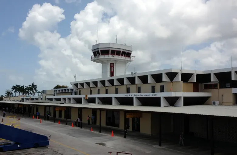 The terminal frontage and control tower at Philip S. W. Goldson International Airport, Belize.