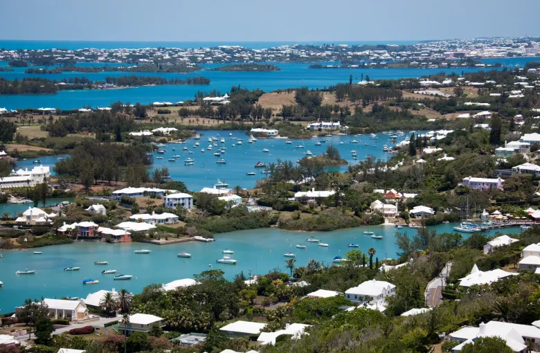 Bermuda seen from Gibbs Hill Lighthouse: inlets, moored boats and white-roofed houses to the horizon.