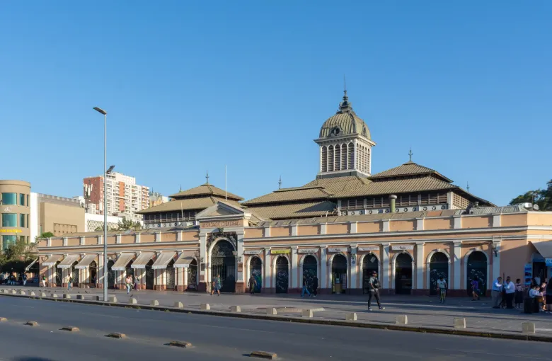 The nineteenth century iron market hall of the Mercado Central in Santiago, with its cupola above the arcaded frontage.