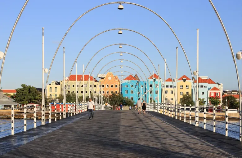 The Otrobanda side of Willemstad across Sint Anna Bay, its colonial houses close packed.
