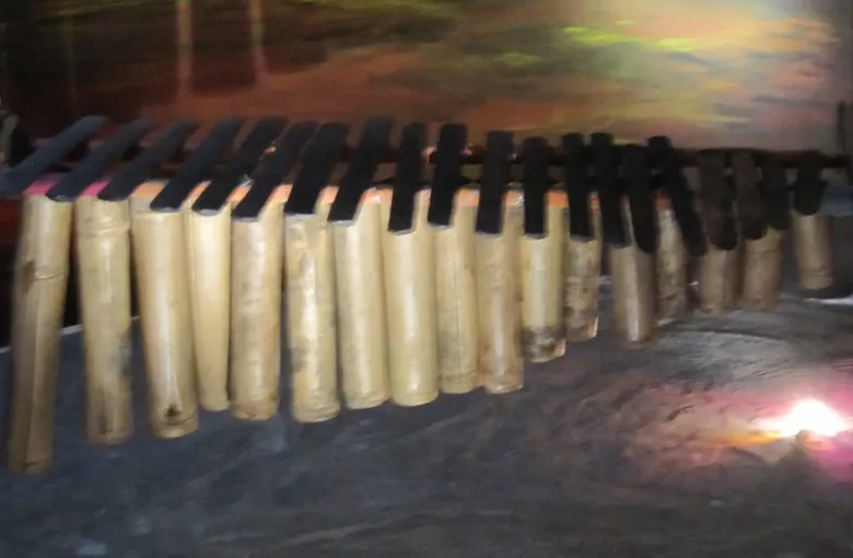A marimba de chonta, the Afro-Ecuadorian marimba of Esmeraldas, its hardwood keys resting above tuned bamboo resonators.