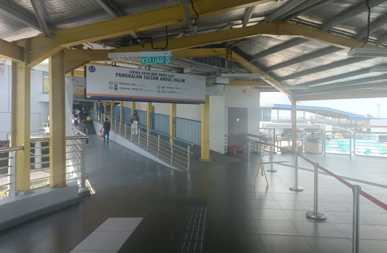 A covered pedestrian linkway leading to the Sultan Abdul Halim ferry terminal at Butterworth, Penang.