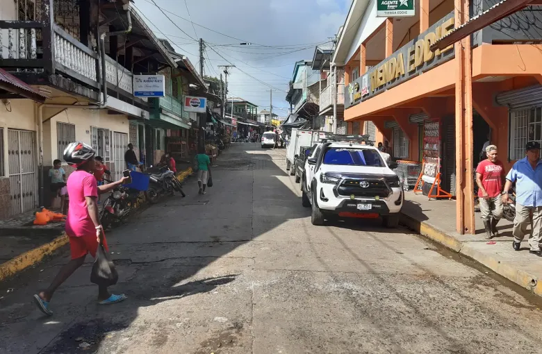 Shopfronts and timber balconies line Aberdeen Street in Bluefields on the Caribbean coast of Nicaragua.