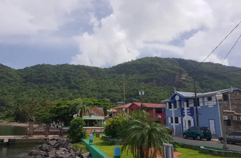 Brightly painted buildings along the waterfront at Soufriere in Saint Lucia.