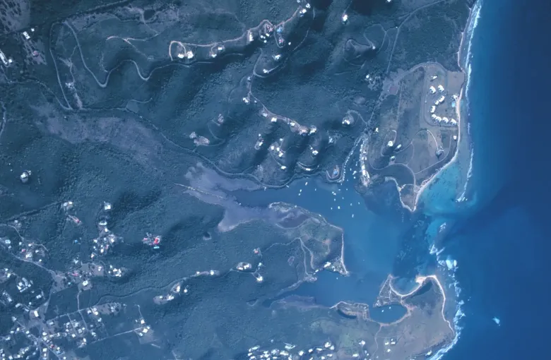Salt River Bay on the north shore of St Croix from the air, its inlet opening between wooded slopes.